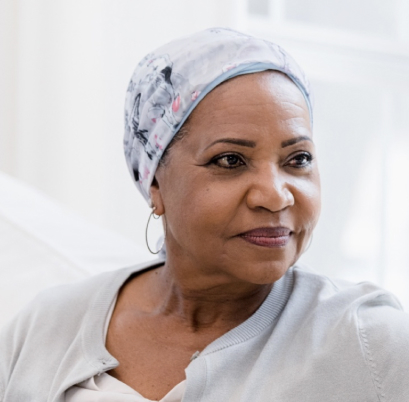 Woman in a cap looking to the side